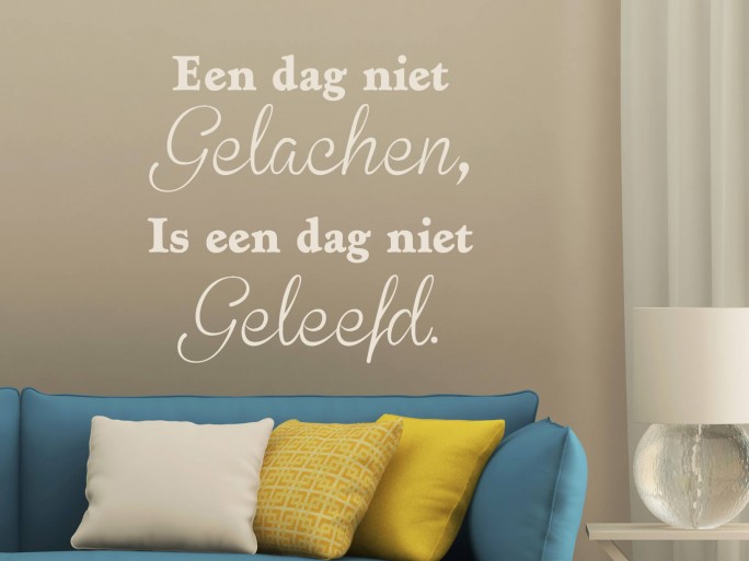 Muursticker "Een dag niet gelachen, is een dag niet geleefd."